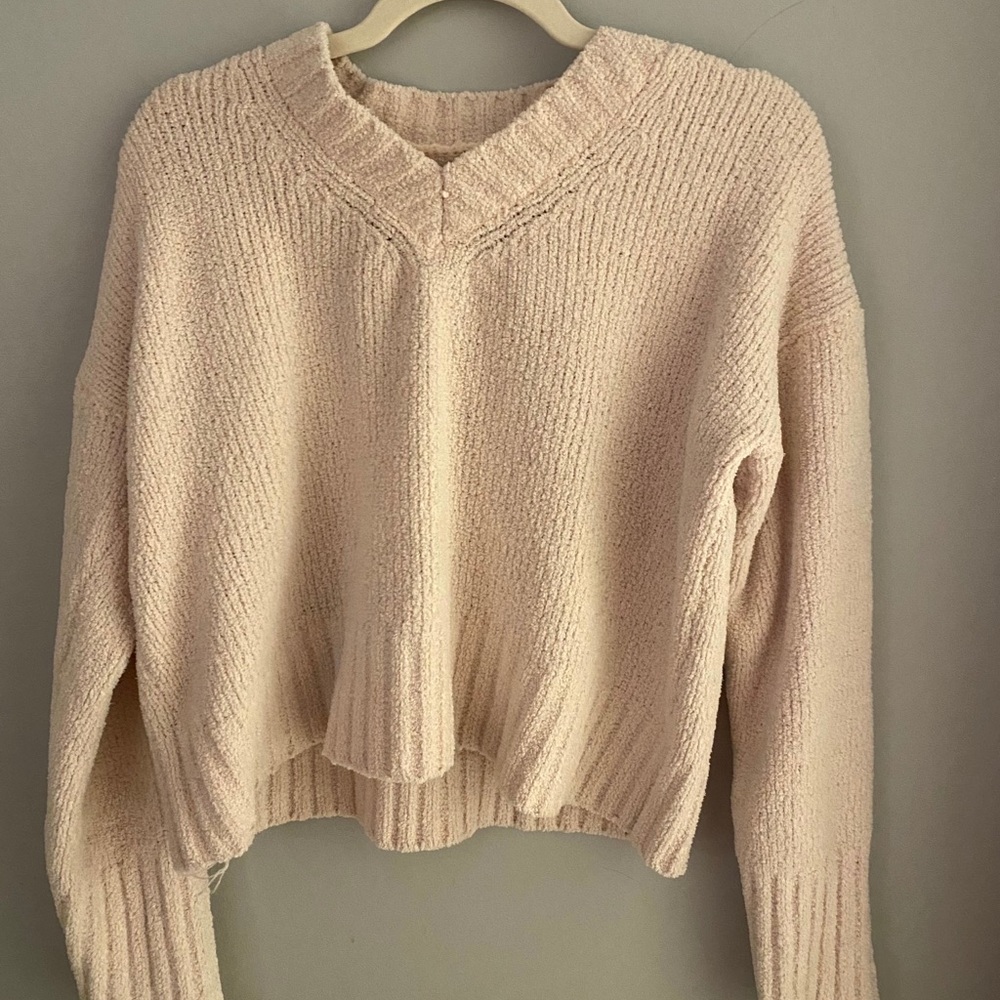 pink v-neck sweater
